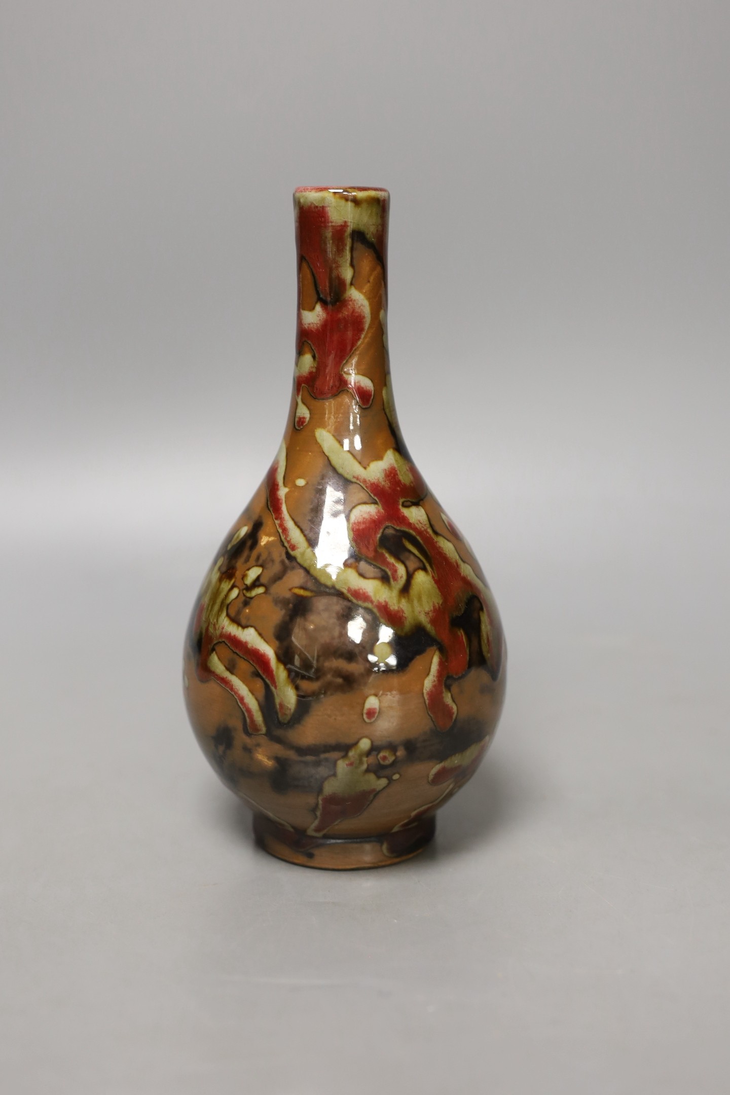 A Chinese flambé glazed vase-18 cms high.